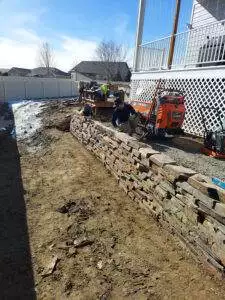 CW Designs in Billings Montana helps ensure that your yard is easier to maintain, retaining walls made of stone or concrete block keep the dirt back, and the lawns level.